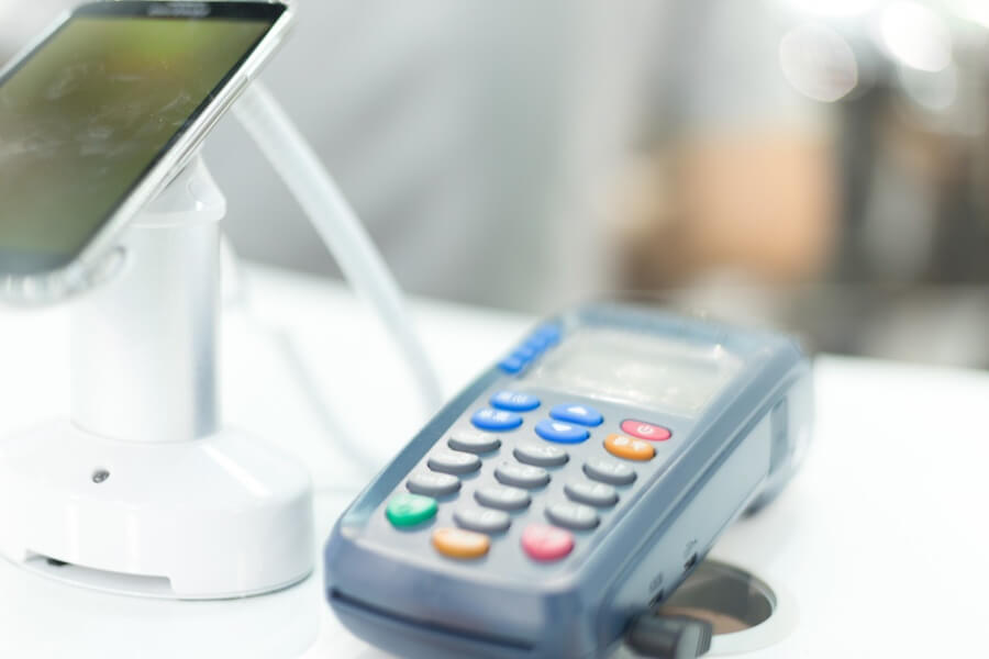 Credit Card Machine attached to a Point of Sale System (POS)
