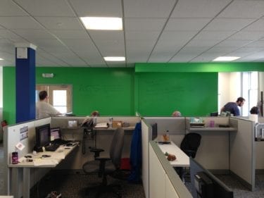 New completed office with green dry erase board wall