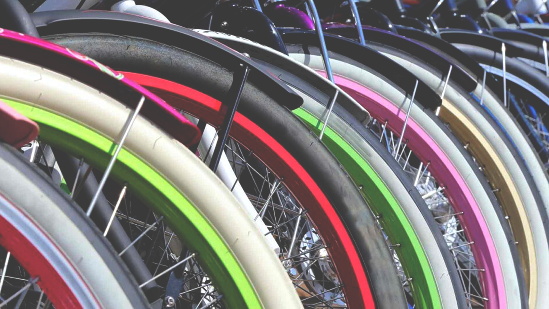 Cruiser bicycle wheels in a line
