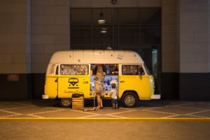 pexels-photo-117518 Food truck with woman and child ordering at night