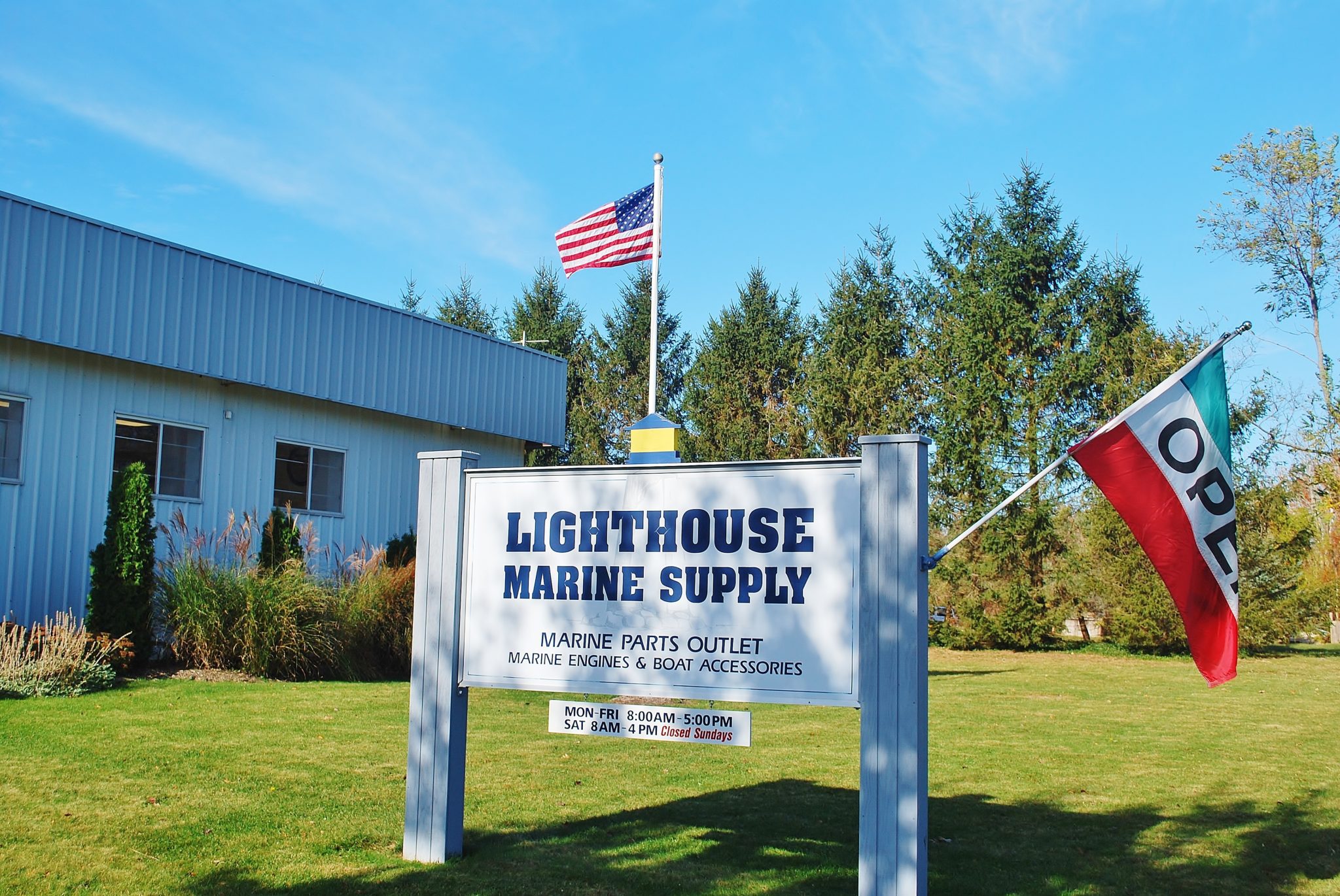 Lighthouse Marine Supply Sign