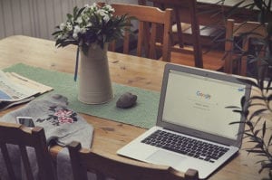 Google search screen on a computer on a table