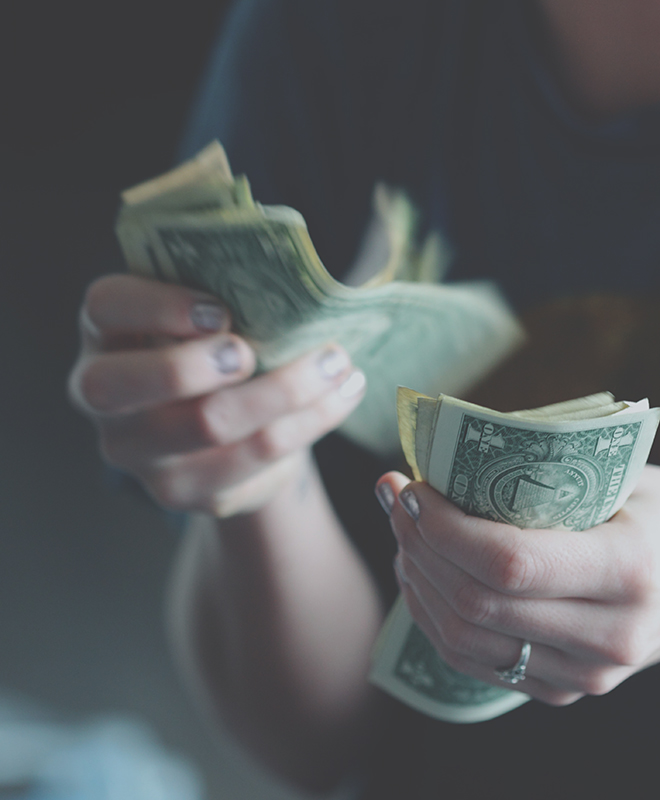 Person counting money