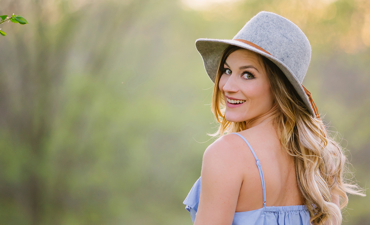 Woman looks back over her shoulder