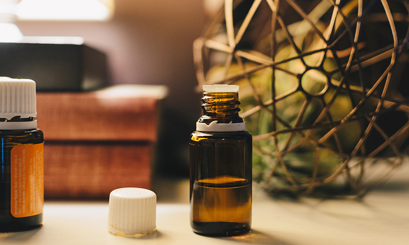 Oils in jars on a table