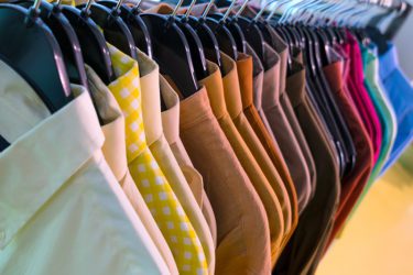 Button up thrift shirts organized by color