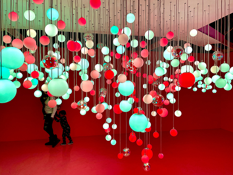Hanging ball installation in red room
