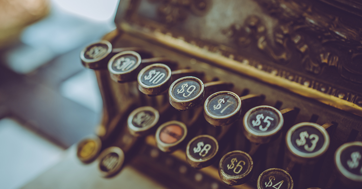 Really old cash register buttons, close-up.