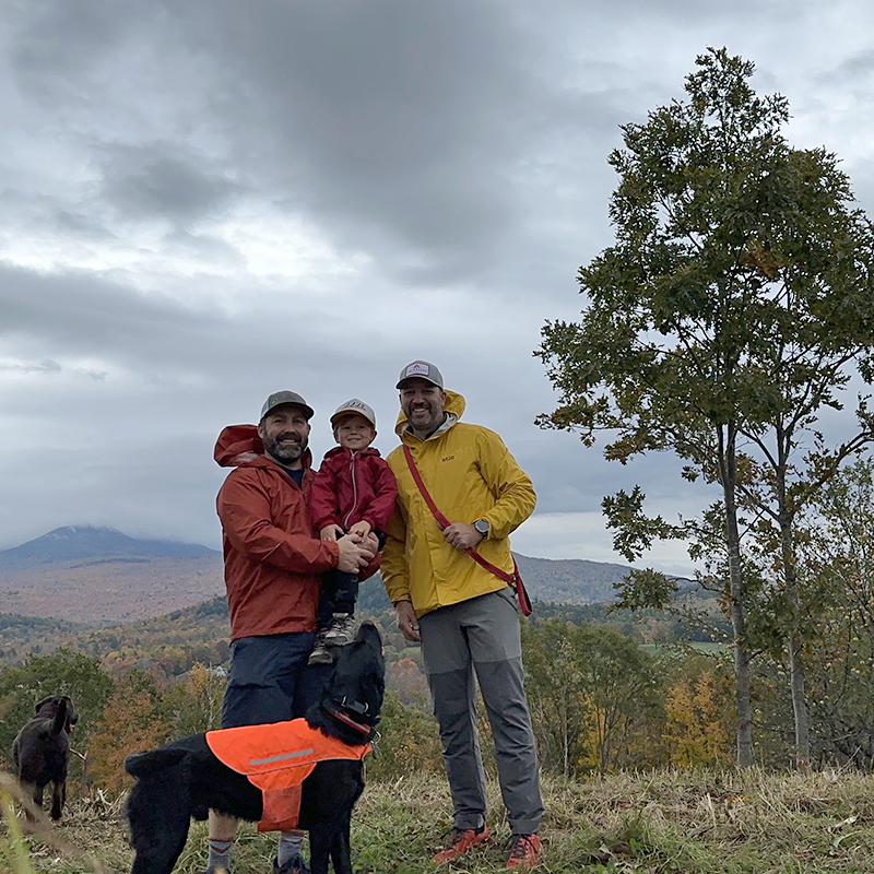 Ben and his son hiking with Kevin and his dog for their RCS Wellness Day.