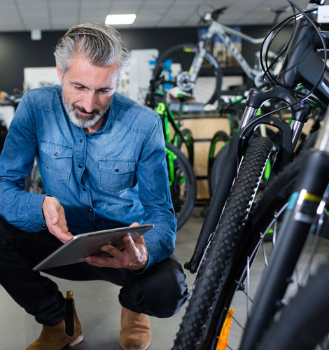 Man working at a bike store